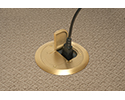 floor box in carpeted floor with device plugged into receptacle