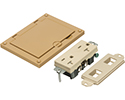 Caramel non-metallic single gang cover kit with flip lid cover. Includes (1) 20A decorator style receptacle, (1) gasket, (1) Low voltage insert.