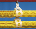 two large cable bundles supported by the loop cable supports and beam clamp