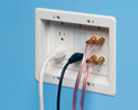 three gang recessed TV box with power and low voltage cables plugged in